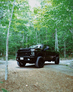 Cognito Motorsports Performance 4 Inch Front/2 Inch Rear Lift; Remote-Reservoir Fox Shocks 110-P0896